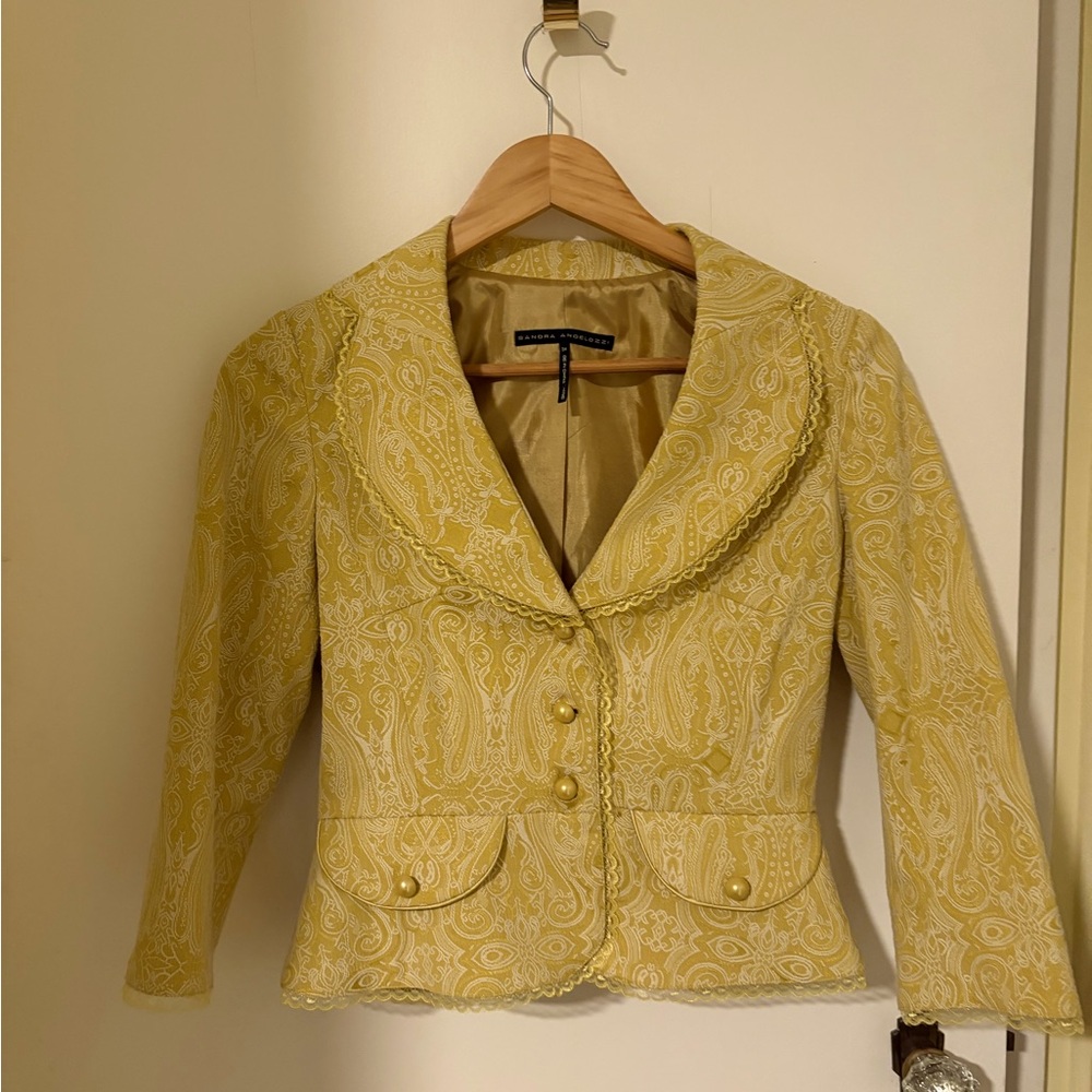 Sandra Angelozzi cropped blazer 
Lace detail extra button